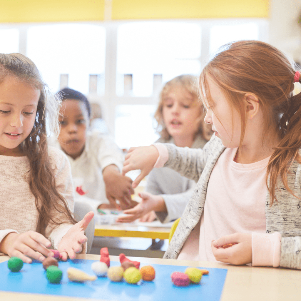 kindergarteners engaged in hands-on, play-based learning